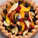 Discover the charm and simplicity of making a rustic fruit tart at home with this comprehensive guide. Learn the history, essential ingredients, and step-by-step preparation techniques for creating a delightful dessert that features a buttery, flaky crust and a luscious fruit filling. Perfect for any occasion, this rustic fruit tart offers both visual appeal and irresistible flavor. Experiment with different fruits and customize the recipe to suit your tastes. Whether you're a novice or an experienced baker, this guide will help you achieve stunning results every time.