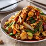 Learn how to make authentic Kung Pao Chicken with this comprehensive guide. Discover the rich history, essential ingredients, and step-by-step cooking instructions for this iconic Sichuan dish. Perfect for home cooks of all levels, this recipe ensures a delightful balance of sweet, savory, and spicy flavors. Serve it with rice, noodles, or lettuce wraps for a versatile and satisfying meal.